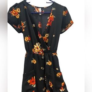 Cute flowy sun dress with orange and yellow flowers!